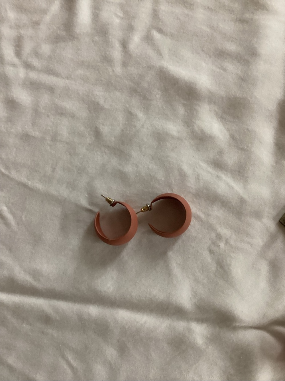 Women’s coral hoop earrings